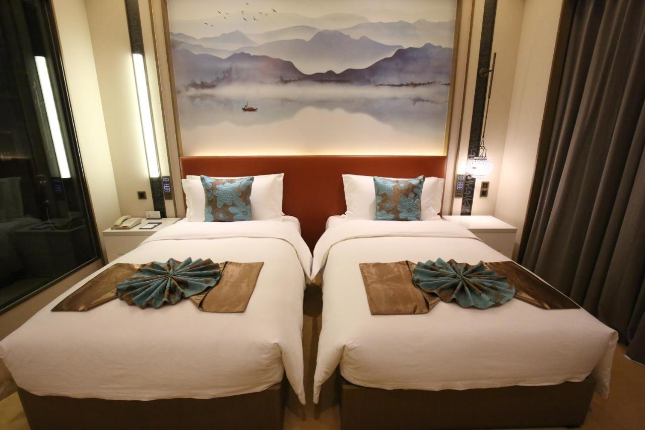Weiselect Wanghu Hotel Куньмин Экстерьер фото