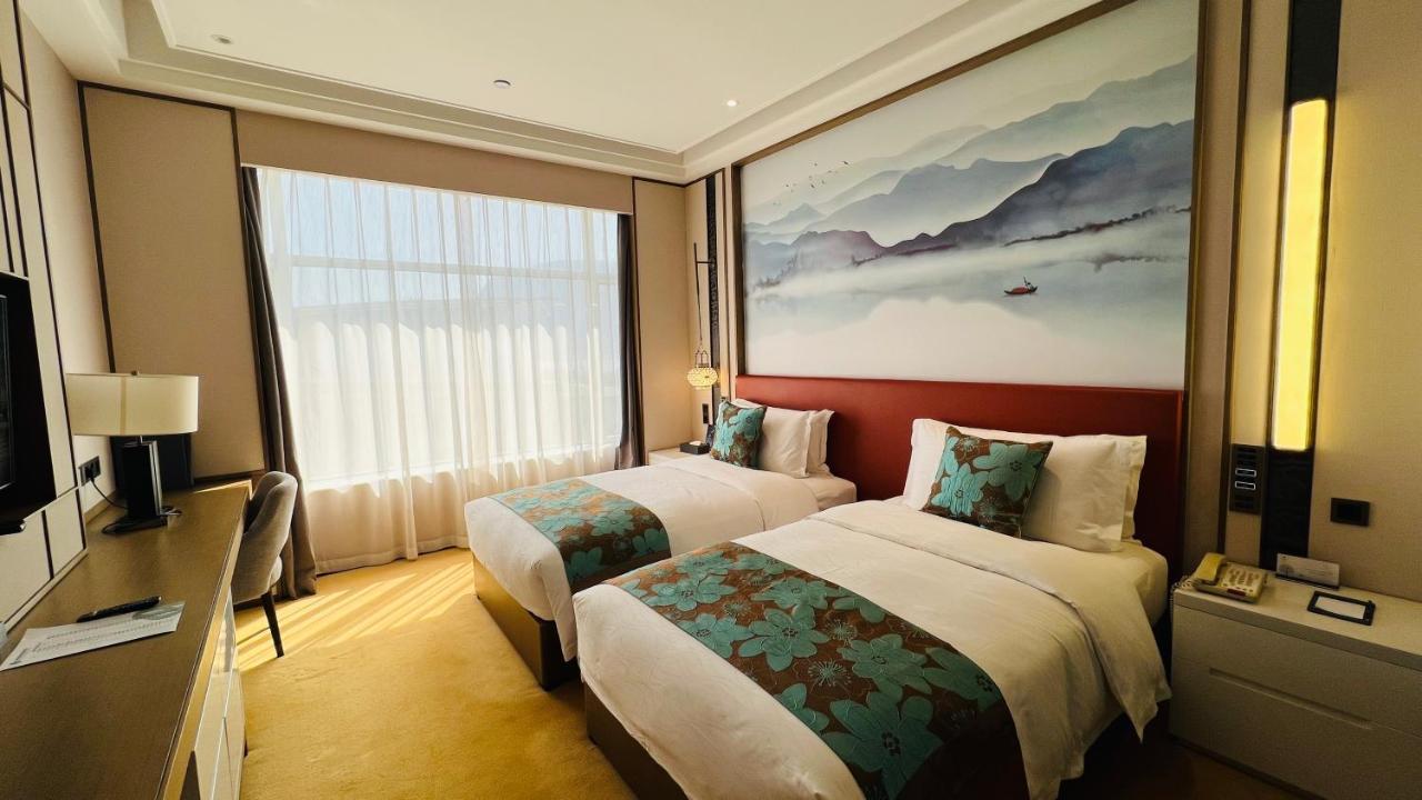 Weiselect Wanghu Hotel Куньмин Экстерьер фото